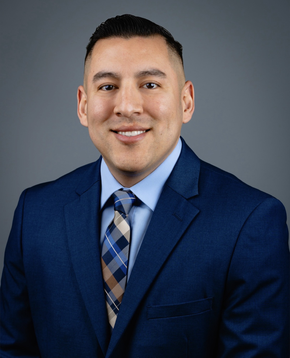 Professional headshot of Claridad Integrated Care founder Alberto Aguirre